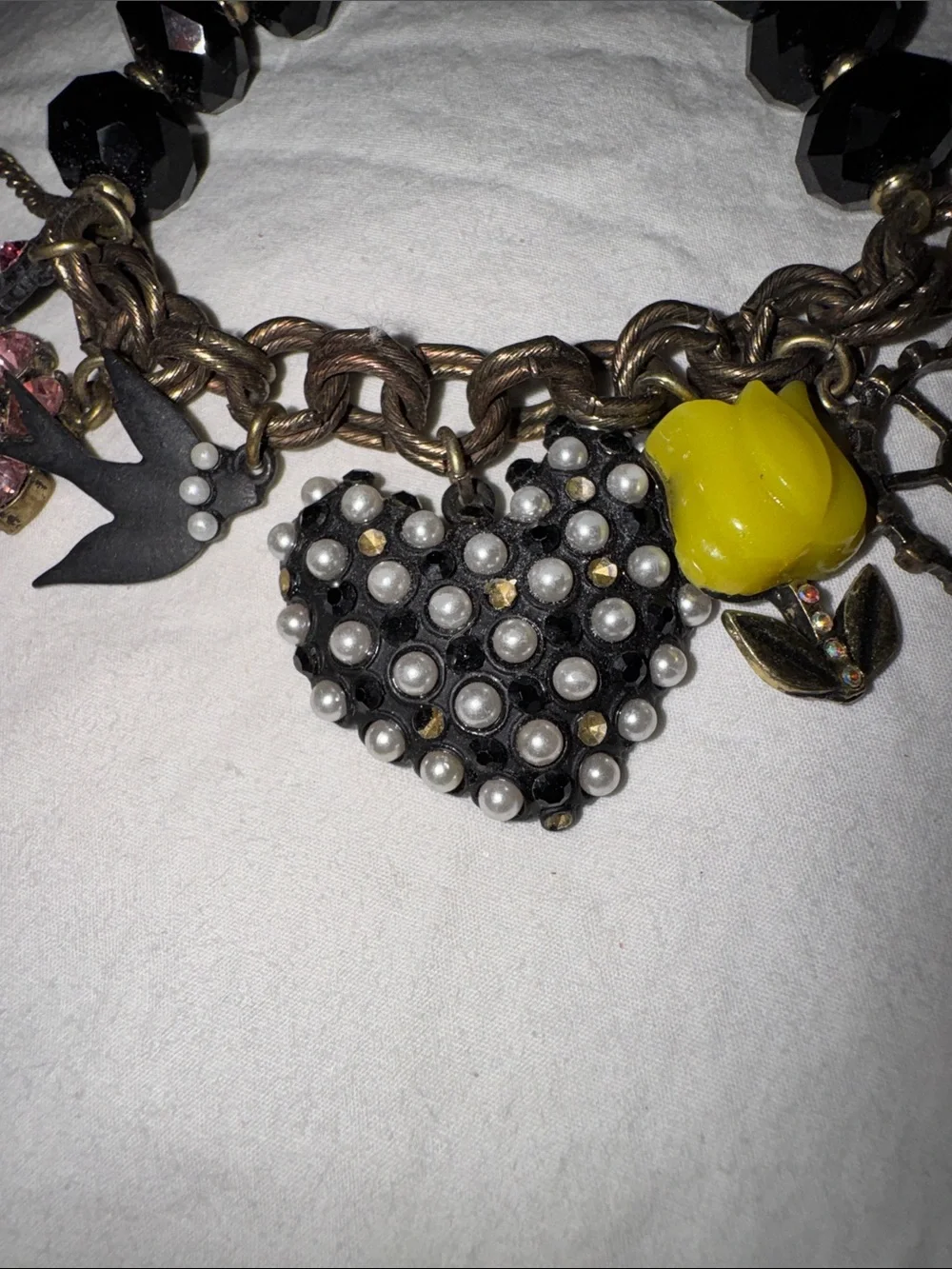This piece is a RARE vintage Betsey Johnson Y2K COMPLETE Charm Bracelet.